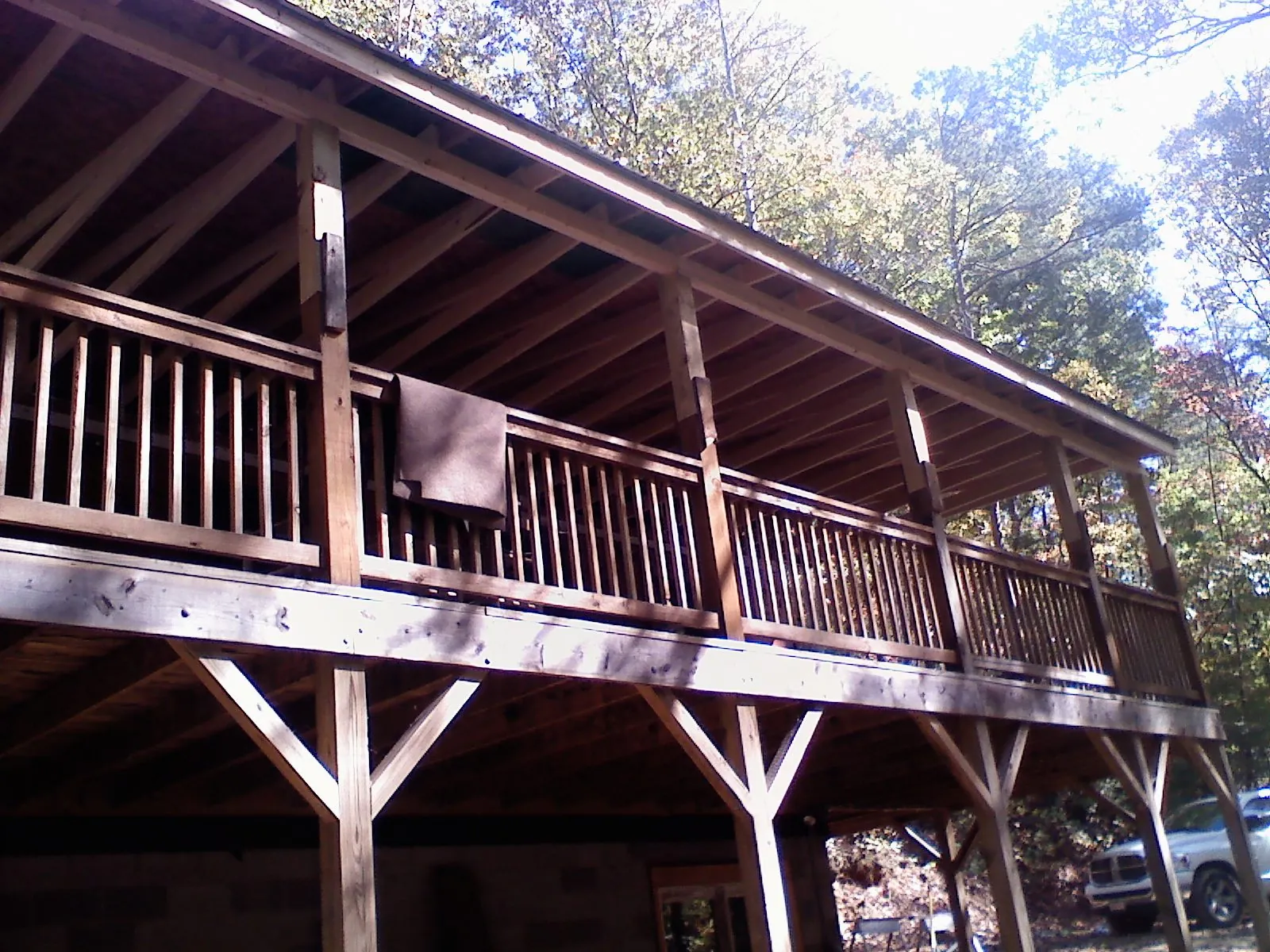 Timber framing under a new elevated porch and deck — Roof Leak Repair in Monongahela by Roofing Brothers